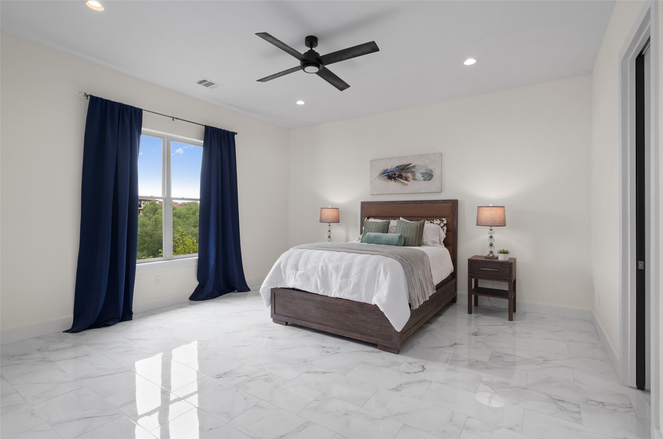 1805 Performer Road Spicewood, TX 78669 - Photo 14 of 40 spacious secondary bedroom with attached bathroom