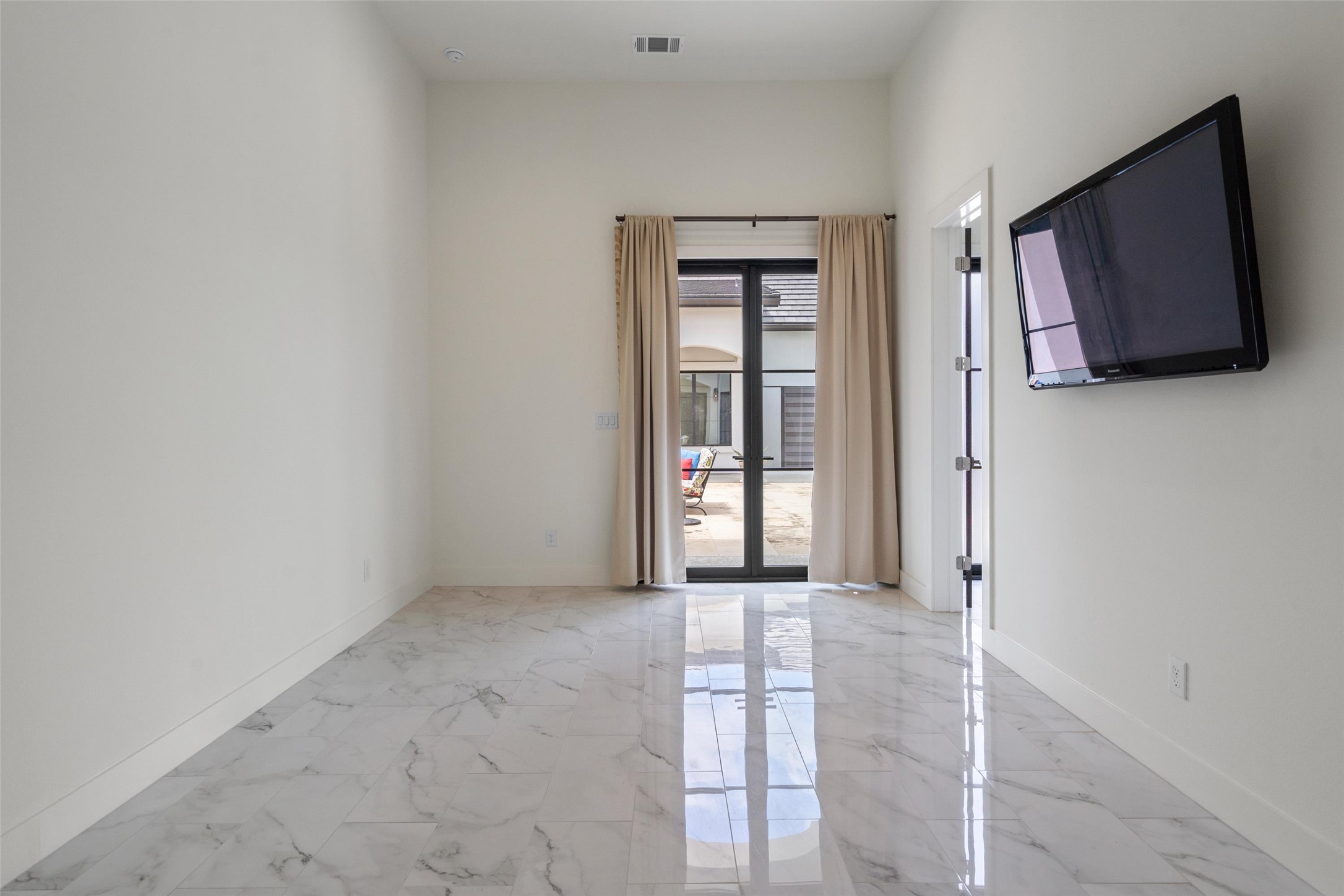 1805 Performer Road Spicewood, TX 78669 - Photo 25 of 40 Guest house right off the pool with a large dual purpose room and full bathroom