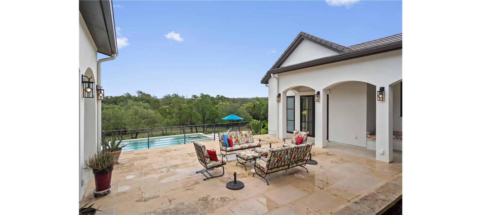 1805 Performer Road Spicewood, TX 78669 - Photo 34 of 40 Expansive outdoor patio for entertaining by the pool