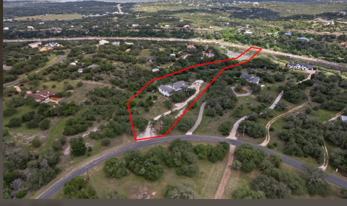 1805 Performer Road Spicewood, TX 78669 - Photo 39 of 40 Aerial perspective of property line all the way down to the river. Vegetation could be cleared to give you a literal River view down to your own river cove.