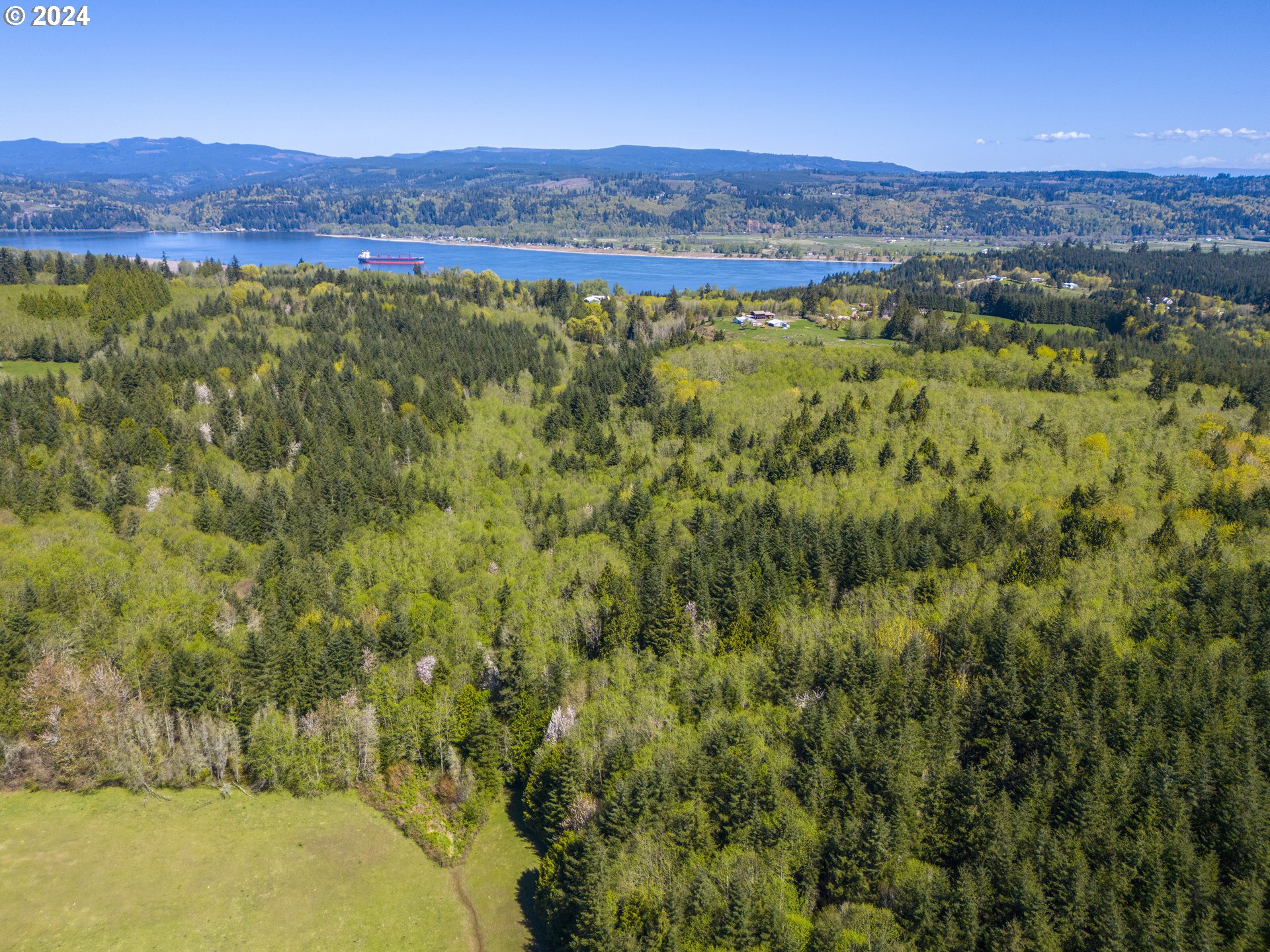 Bodine Clatskanie, OR 97016 - Photo 2 of 31 a view of a lush green hillside and houses