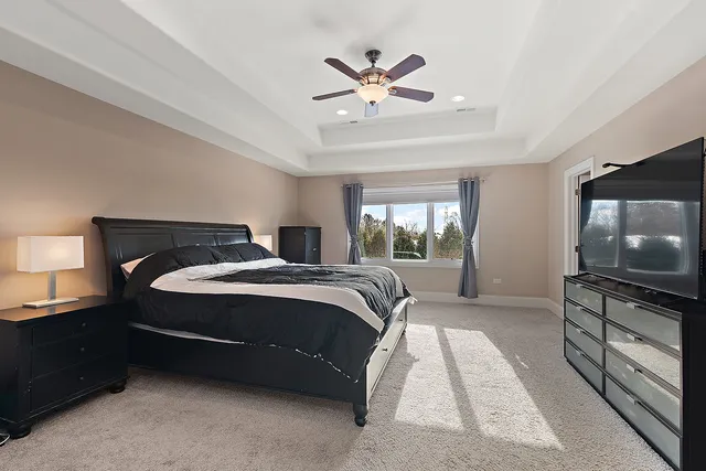 a spacious bathroom with a double vanity sink double and mirror