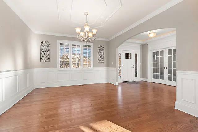 a kitchen with stainless steel appliances granite countertop a stove a sink dishwasher and a refrigerator
