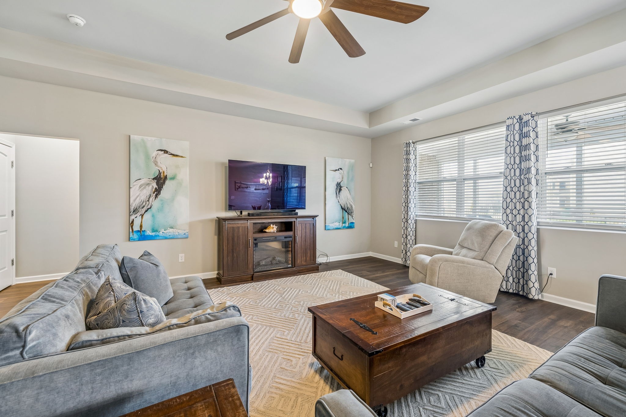1426 Marigold Drive Spring Hill, TN 37174 - Photo 17 of 65 a living room with furniture a rug and a flat screen tv