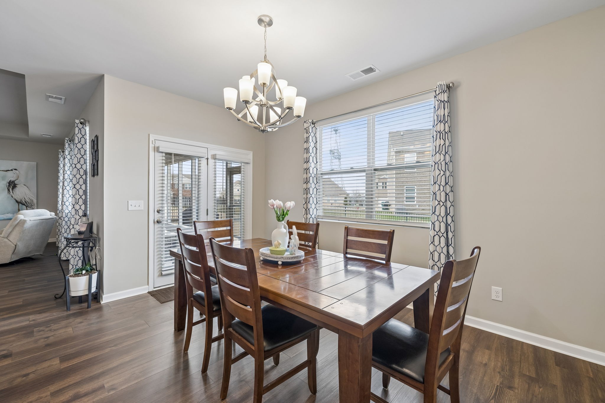 1426 Marigold Drive Spring Hill, TN 37174 - Photo 29 of 65 a view of a dining room with furniture wooden floor and chandelier
