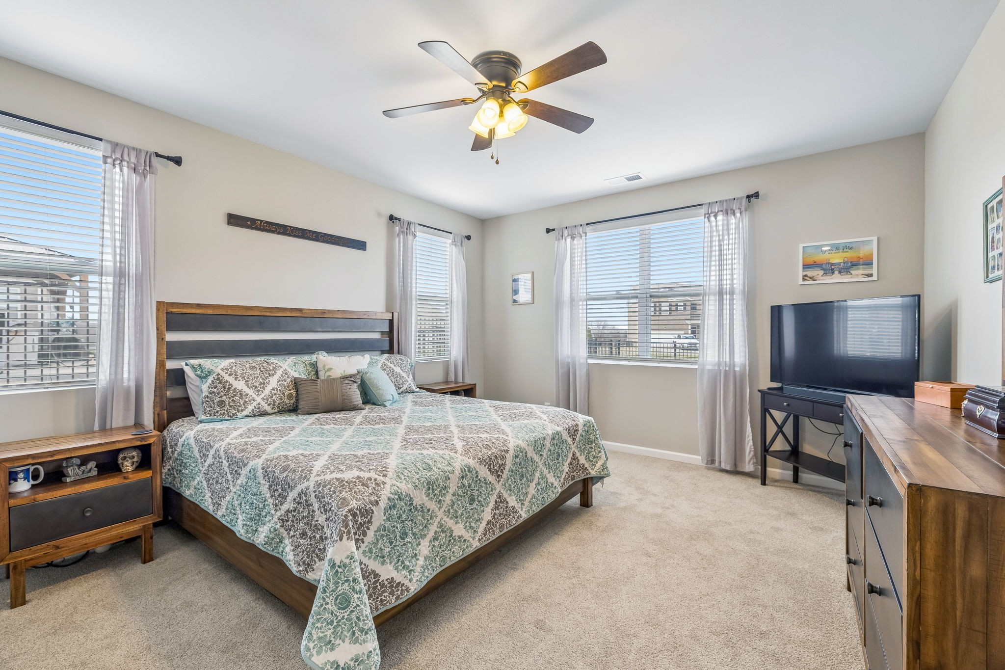1426 Marigold Drive Spring Hill, TN 37174 - Photo 40 of 65 a bedroom with a bed and a flat screen tv