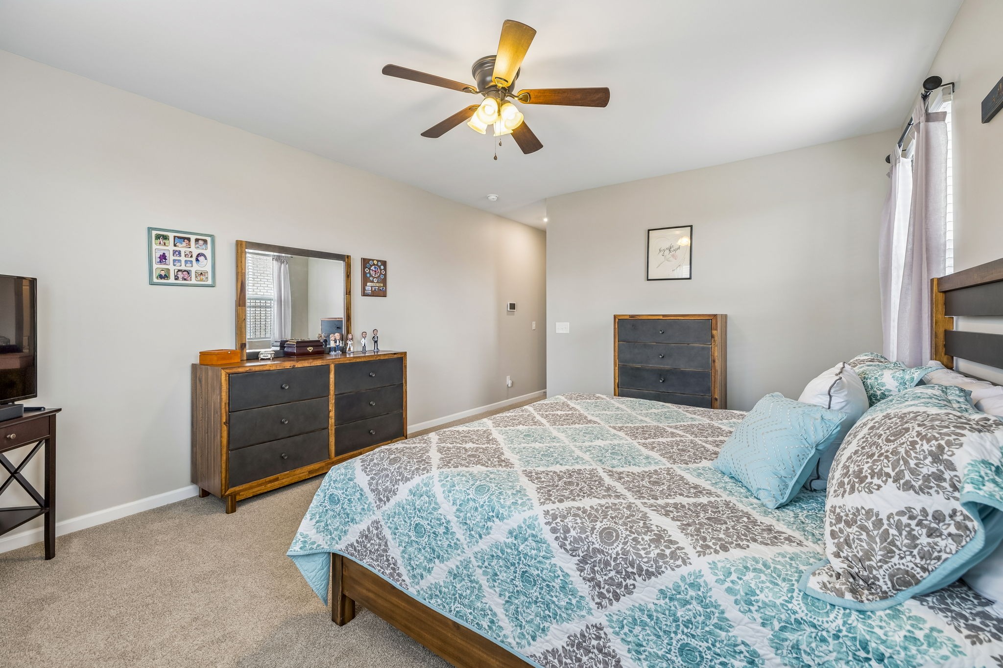 1426 Marigold Drive Spring Hill, TN 37174 - Photo 42 of 65 a bedroom with a bed and a dresser