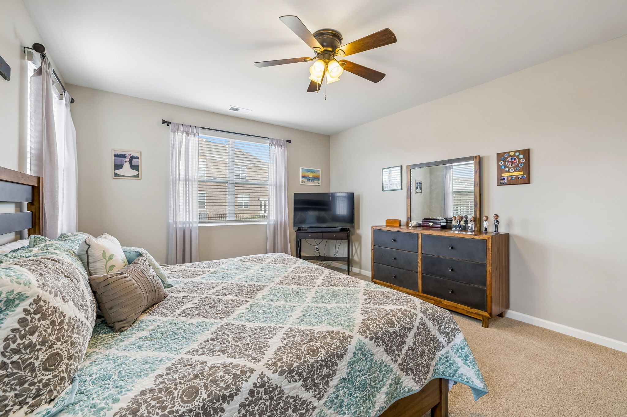 1426 Marigold Drive Spring Hill, TN 37174 - Photo 43 of 65 a bed room with a bed and a television