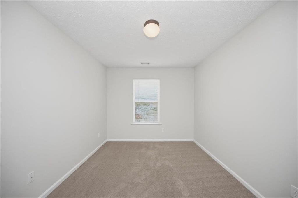 100 Wexford Way Covington, GA 30014 - Photo 30 of 37 a view of a room that has a window
