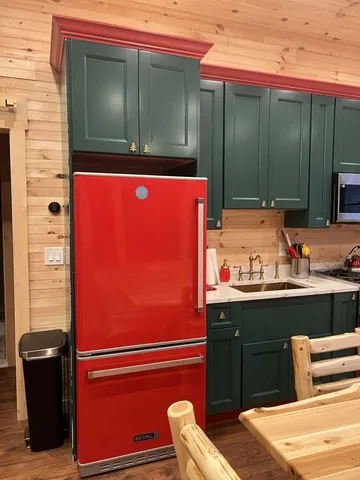 a picture of a bathroom with a sink and a mirror