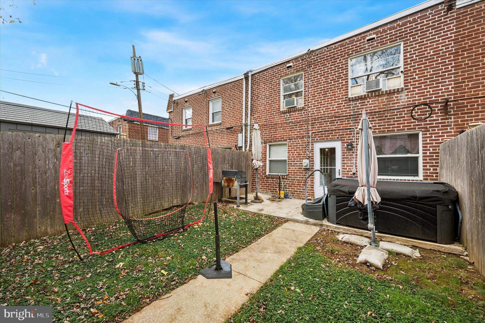 153 Ervin Avenue Marcus Hook, PA 19061 - Photo 15 of 15 a backyard of a house with barbeque oven