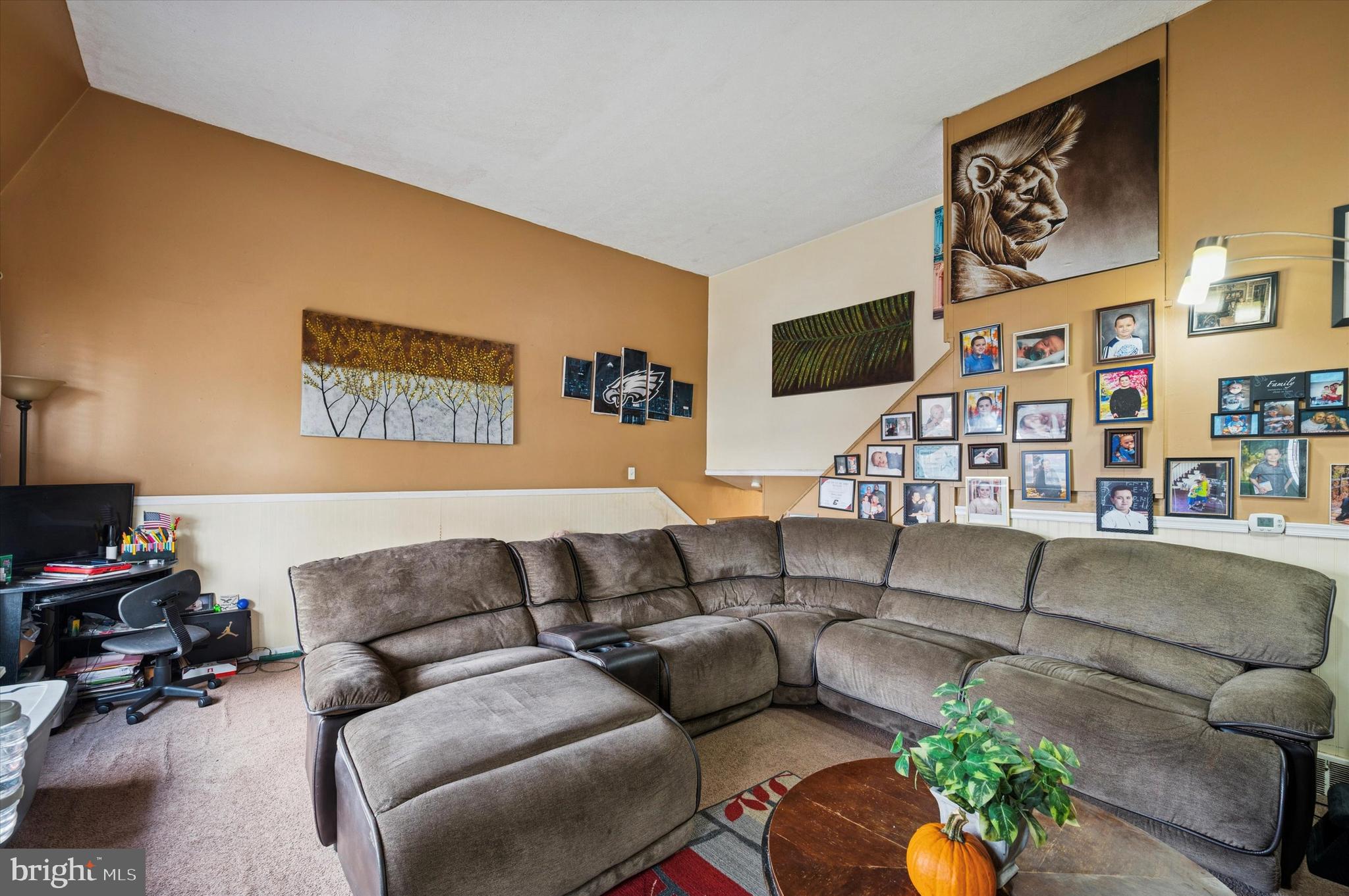 153 Ervin Avenue Marcus Hook, PA 19061 - Photo 3 of 15 a living room with furniture and a flat screen tv