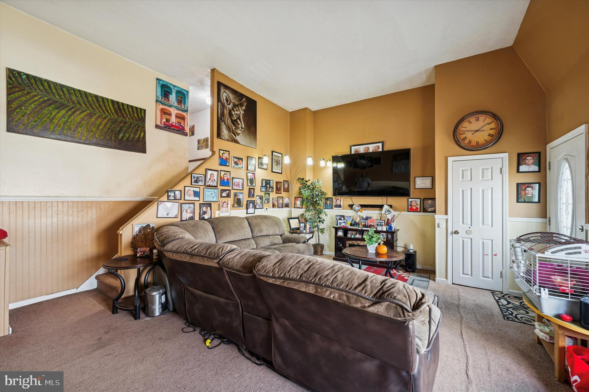153 Ervin Avenue Marcus Hook, PA 19061 - Photo 4 of 15 a living room with furniture and a flat screen tv