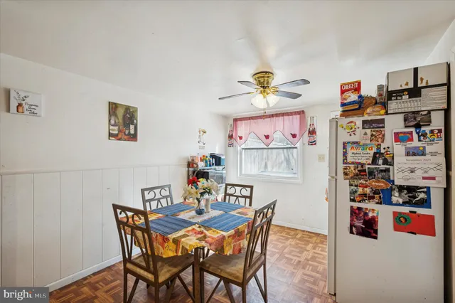 a view of a dining room with shelves