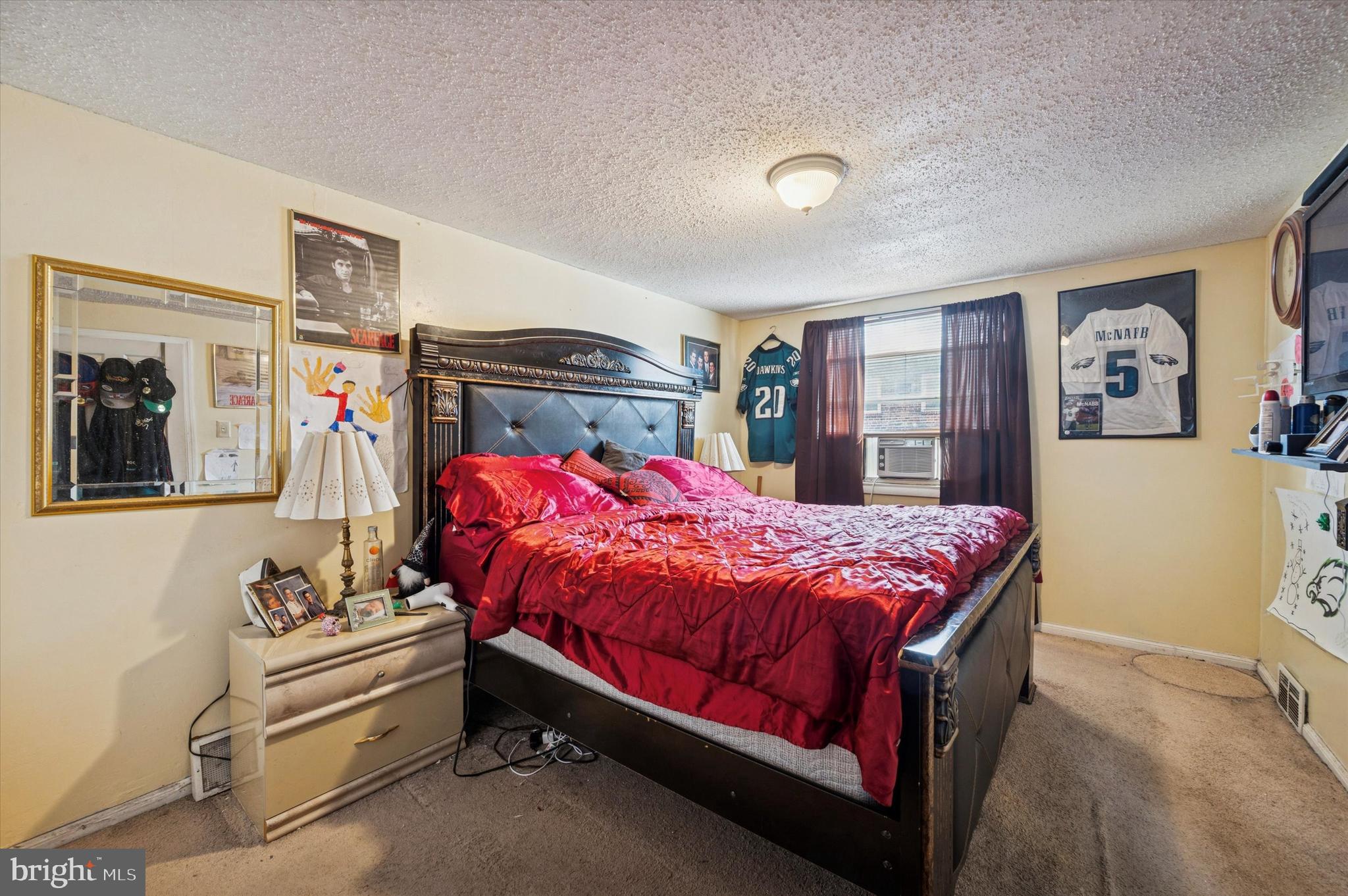 153 Ervin Avenue Marcus Hook, PA 19061 - Photo 8 of 15 a bed room with a bed and a window