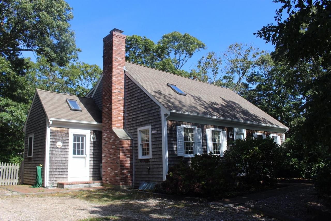 a backyard of a house with garden