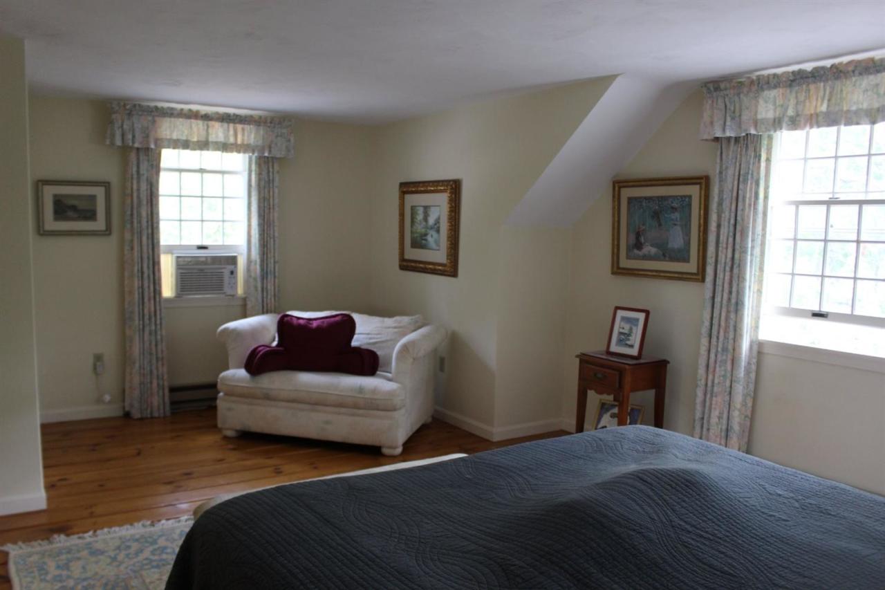 40 Lighthouse Lane Eastham, MA 02642 - Photo 19 of 33 a bedroom with two beds and a window