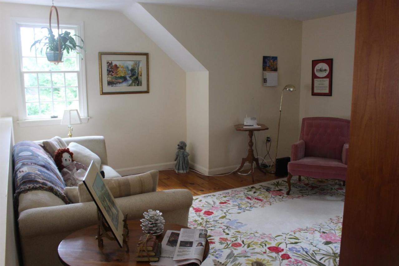 40 Lighthouse Lane Eastham, MA 02642 - Photo 20 of 33 a living room with furniture and a window