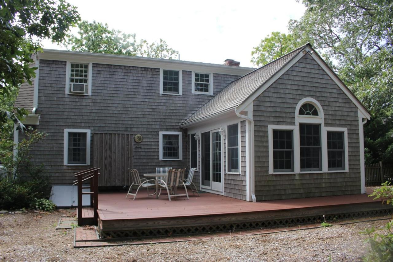 40 Lighthouse Lane Eastham, MA 02642 - Photo 28 of 33 a view of house with outdoor seating area