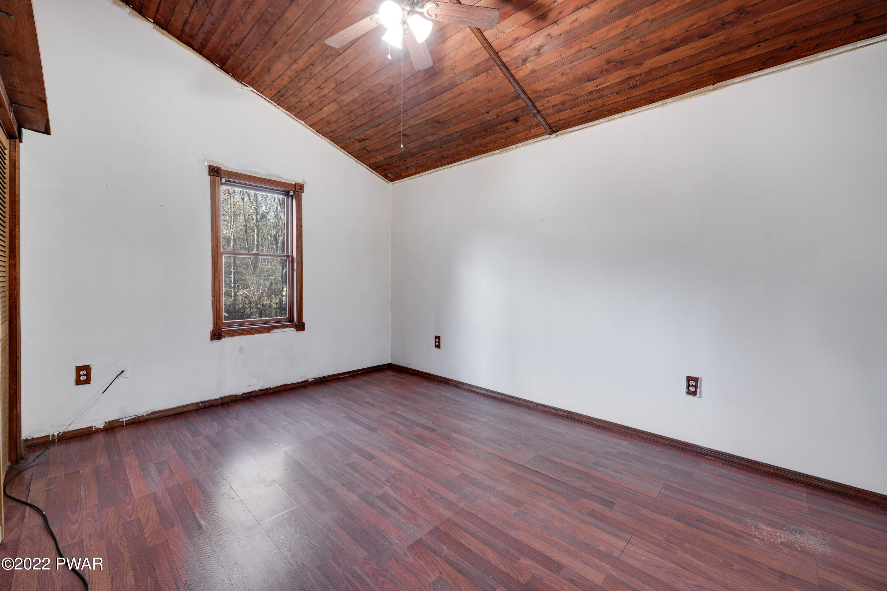 2513 Milford Road Bushkill, PA 18324 - Photo 16 of 24 a view of an empty room with wooden floor