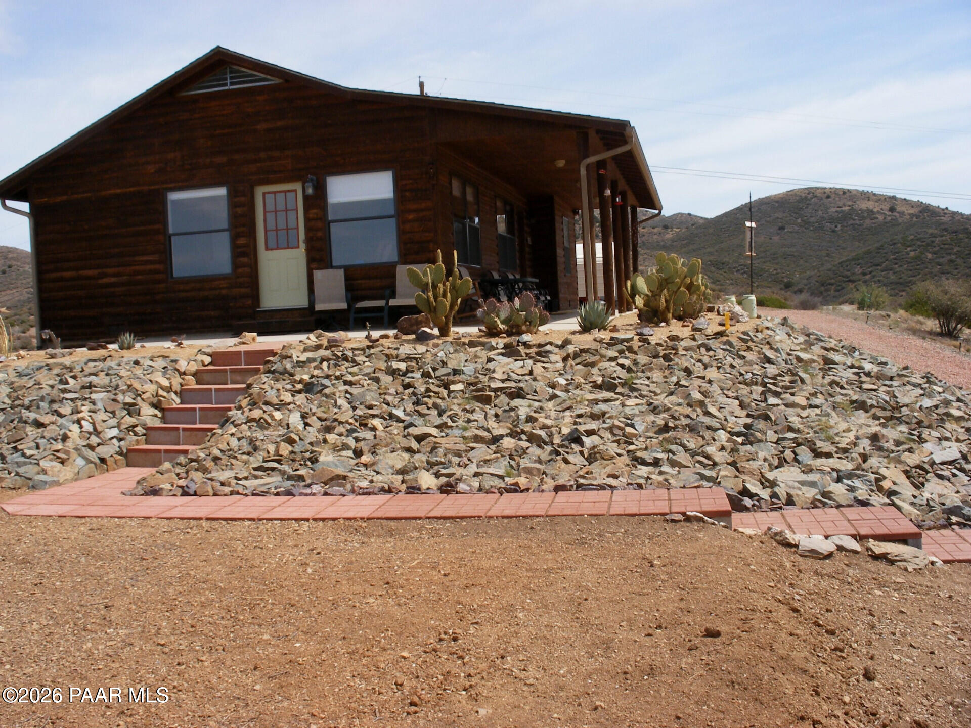 14504 East Ridge Way Dewey-Humboldt, AZ 86327 - Photo 18 of 34 a front view of house with a yard