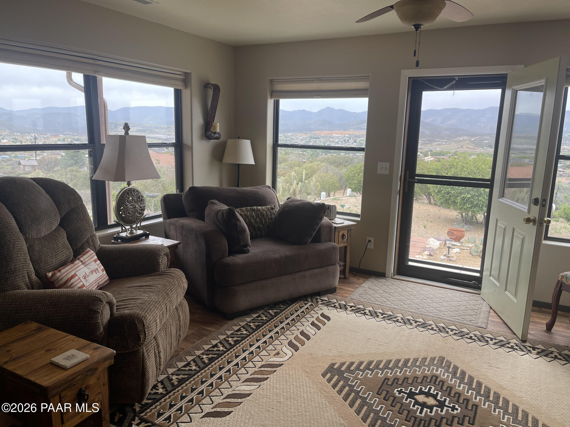 14504 East Ridge Way Dewey-Humboldt, AZ 86327 - Photo 27 of 34 a living room with furniture and a floor to ceiling window