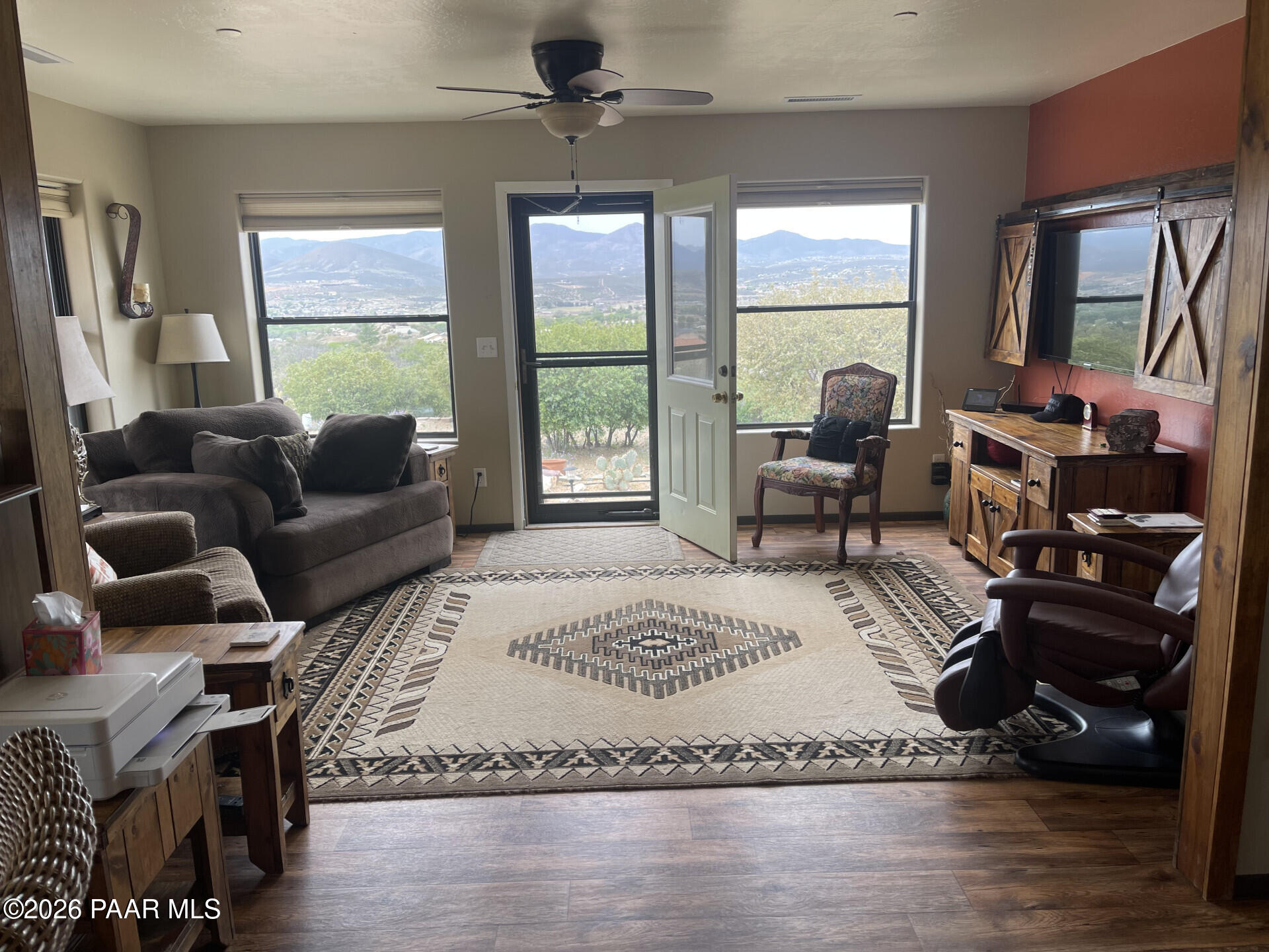 14504 East Ridge Way Dewey-Humboldt, AZ 86327 - Photo 28 of 34 a living room with furniture and a floor to ceiling window