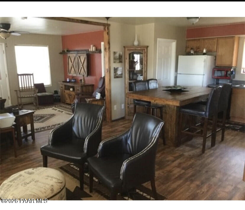 14504 East Ridge Way Dewey-Humboldt, AZ 86327 - Photo 4 of 34 a living room with furniture and wooden floor
