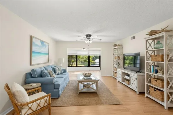 a room with gym equipment and a large window