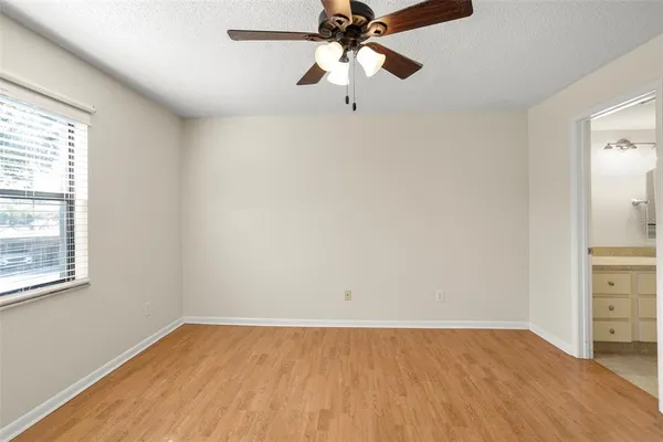 a backyard with table and chairs