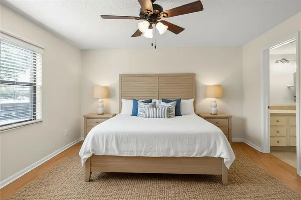 a view of a garden with a house