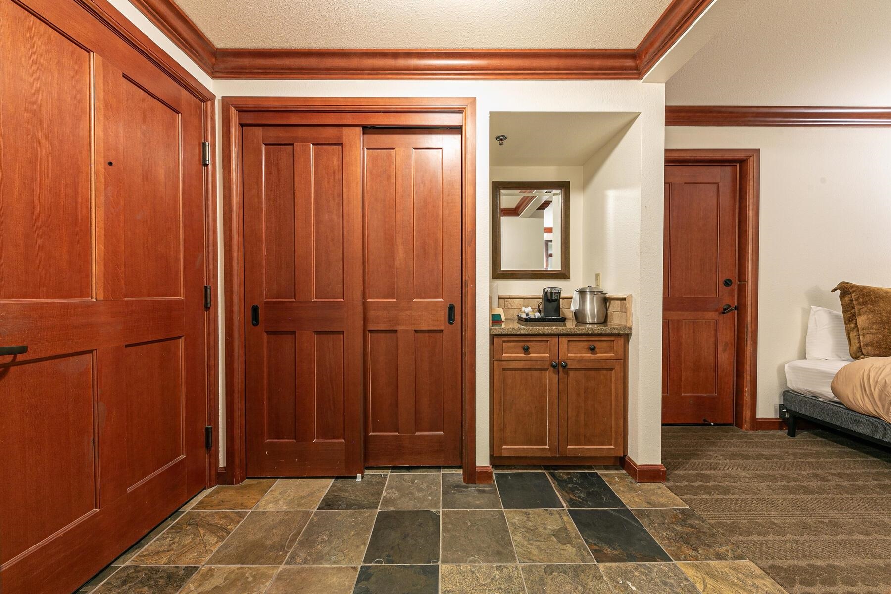 400 Resort Road, Unit 317 319 Olympic Valley, CA 96146 - Photo 17 of 25 a view of a hallway with closet and bathroom
