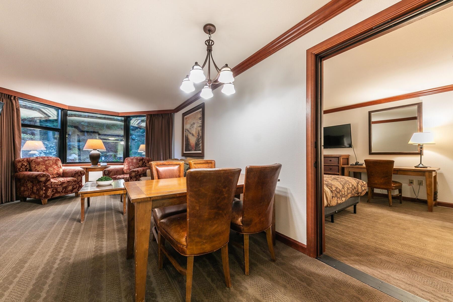 400 Resort Road, Unit 317 319 Olympic Valley, CA 96146 - Photo 18 of 25 a view of a dining room with furniture window and wooden floor