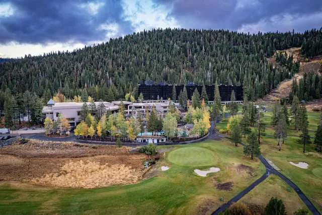 a view of a swimming pool with an ocean view