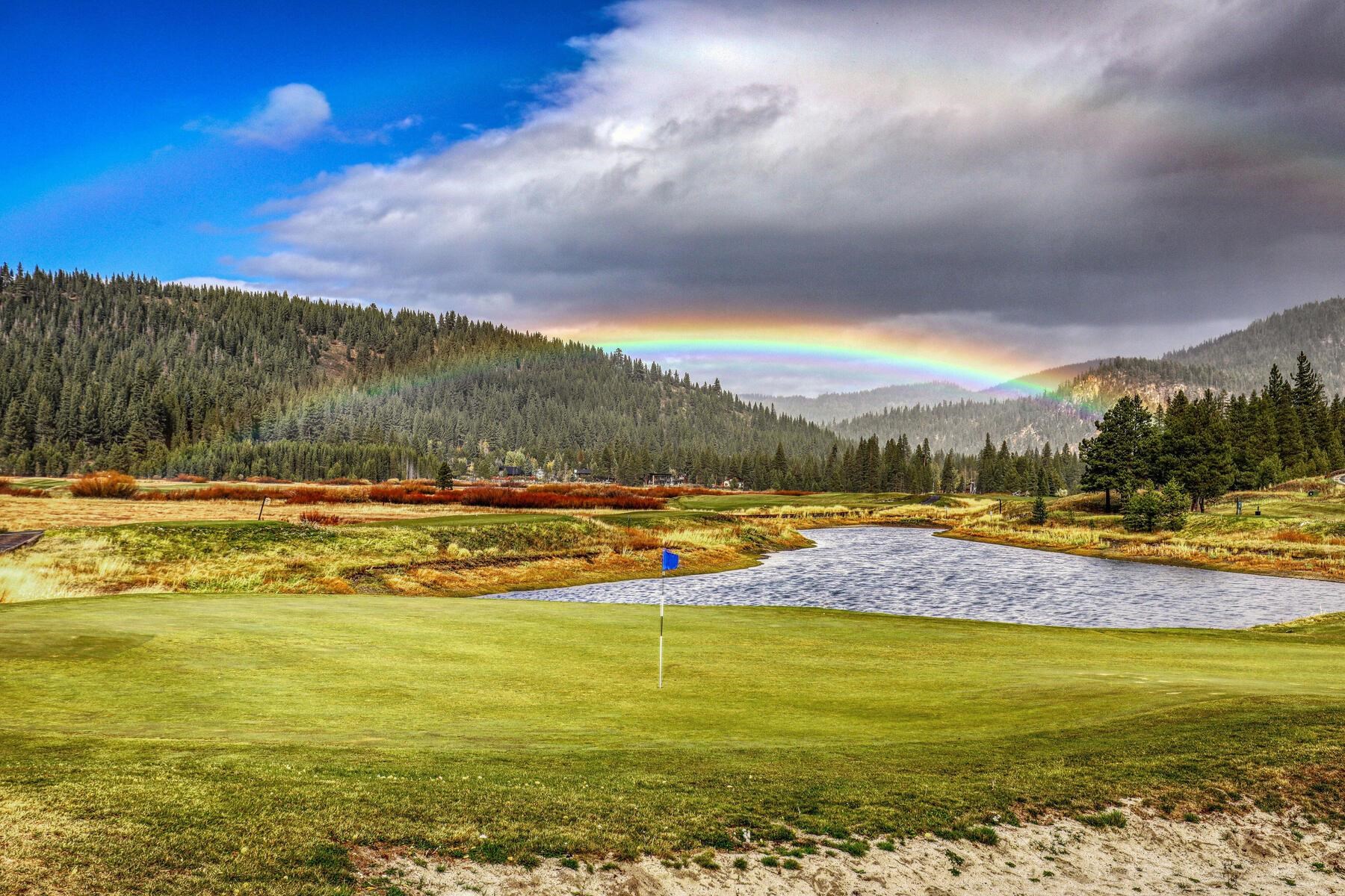 400 Resort Road, Unit 317 319 Olympic Valley, CA 96146 - Photo 22 of 25 a view of a swimming pool with an ocean view