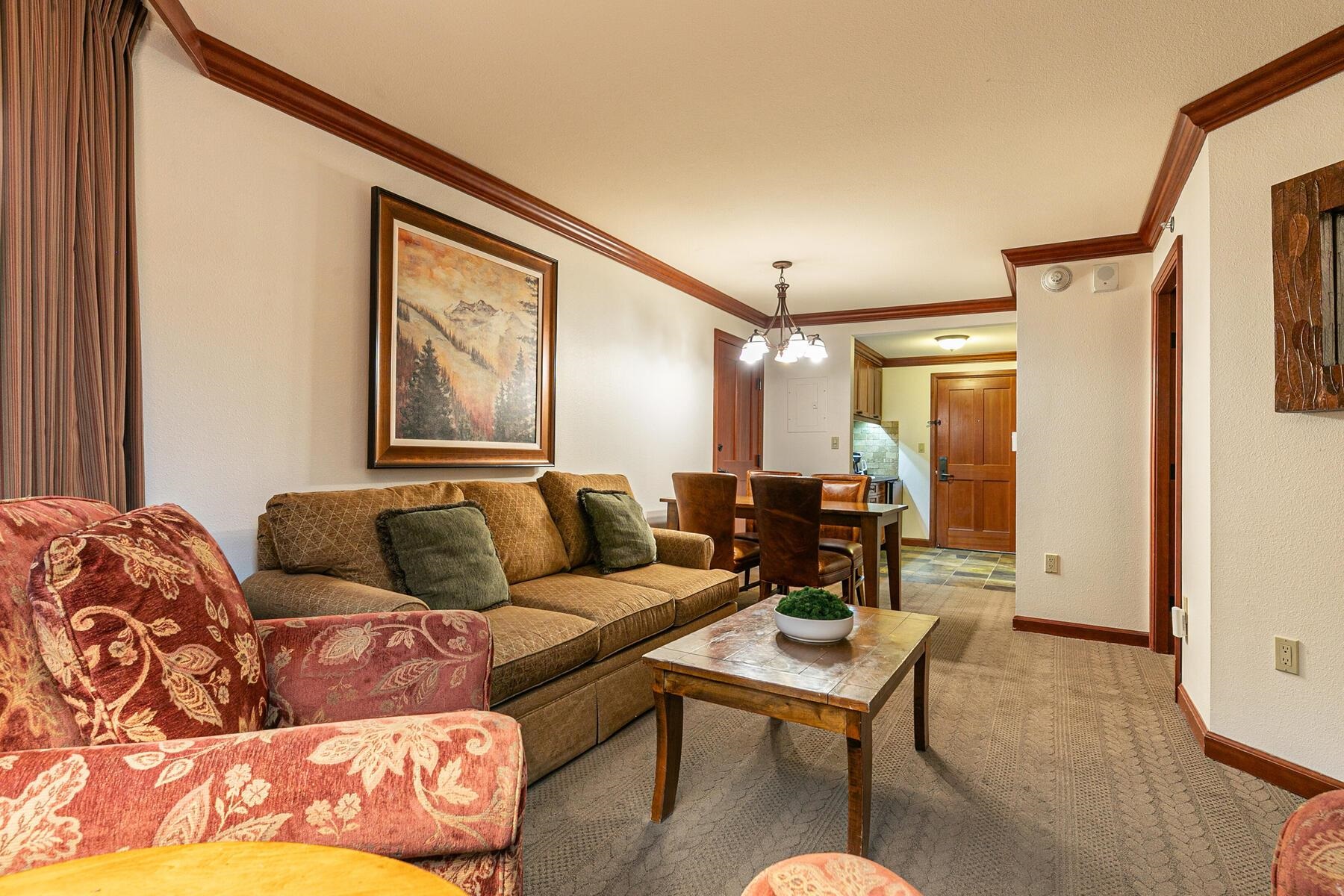 400 Resort Road, Unit 317 319 Olympic Valley, CA 96146 - Photo 3 of 25 a living room with furniture and a large window