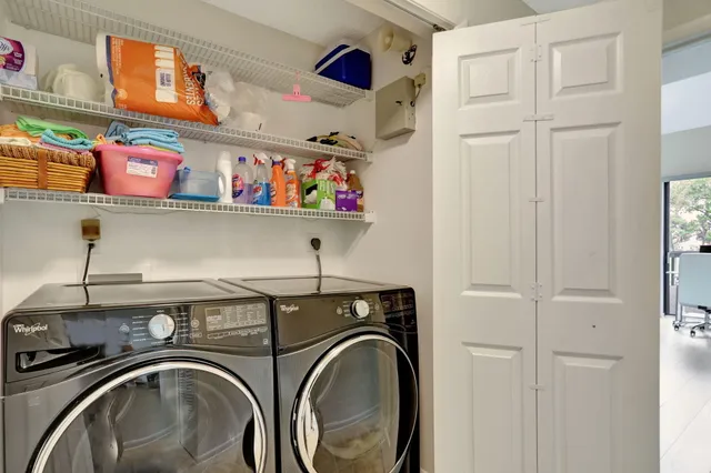 a utility room with dryer and washer