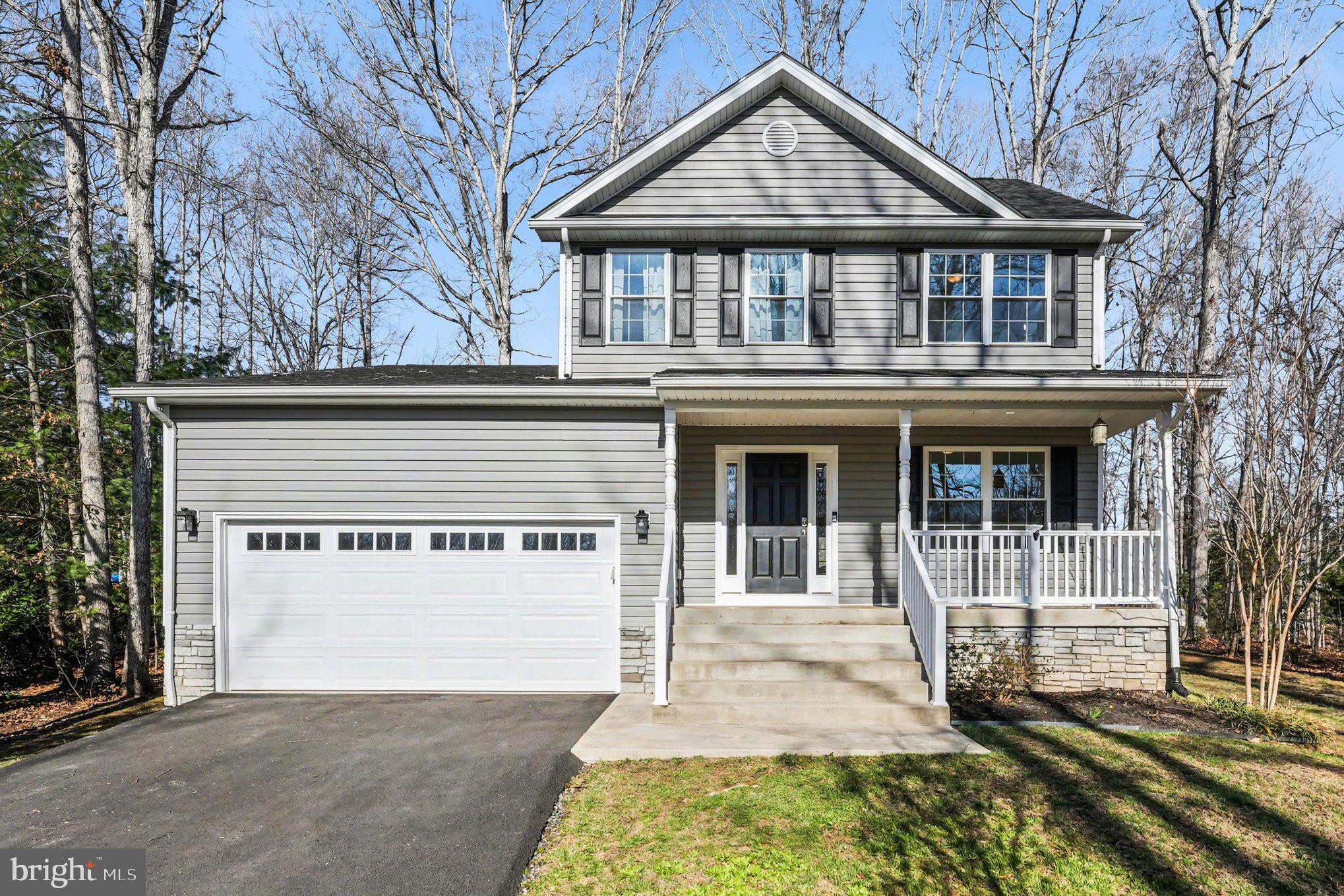 117 Butler Circle Locust Grove, VA 22508 - Photo 2 of 35 front view of a house with a yard