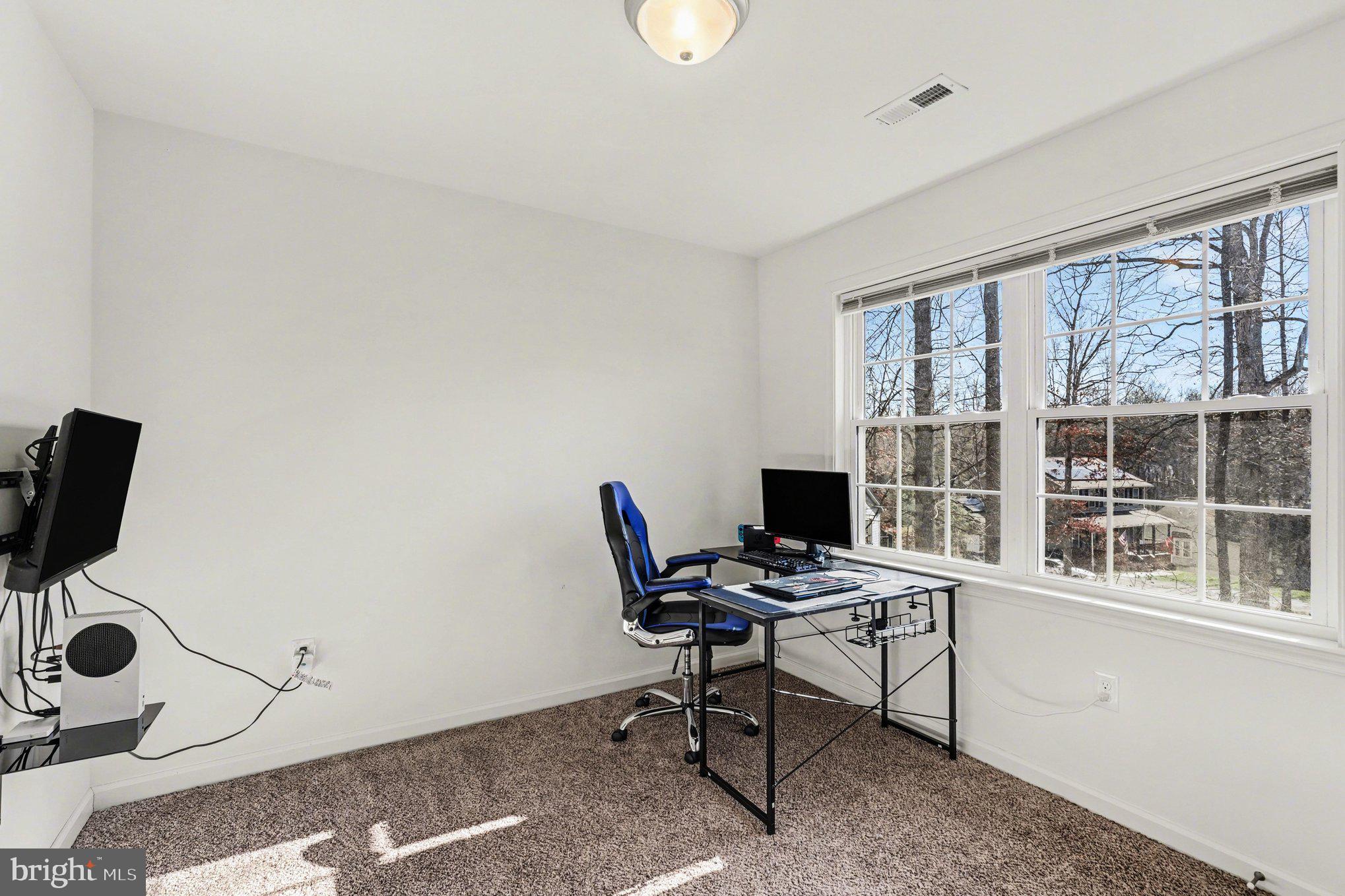 117 Butler Circle Locust Grove, VA 22508 - Photo 26 of 35 a workspace with furniture and a window