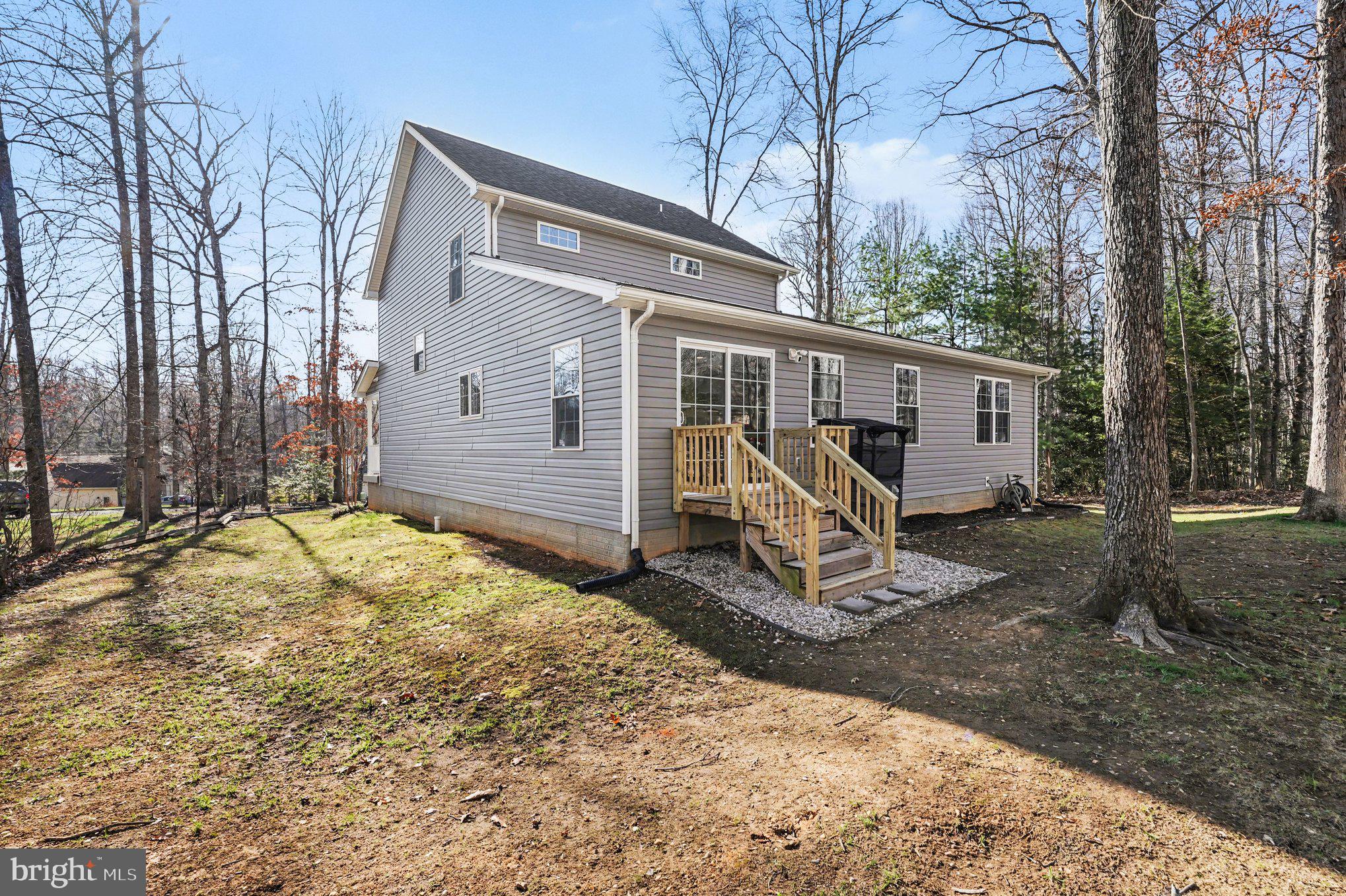 117 Butler Circle Locust Grove, VA 22508 - Photo 33 of 35 a view of a house with backyard