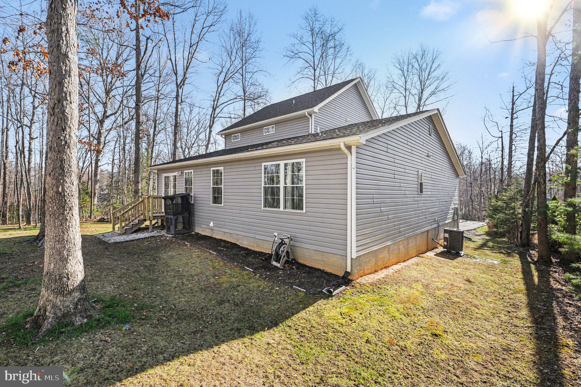 117 Butler Circle Locust Grove, VA 22508 - Photo 34 of 35 a view of a house with a yard