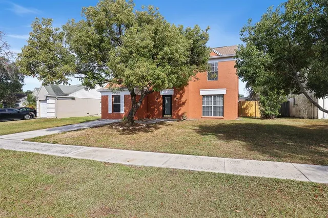 a view of a yard in front of a house