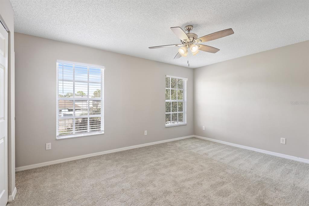 2107 Shady Point Lane Brandon, FL 33510 - Photo 22 of 38 a view of an empty room with a window