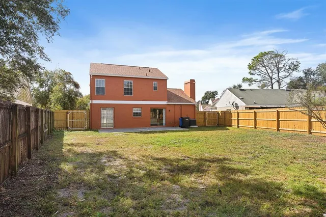 a house with trees in front of it