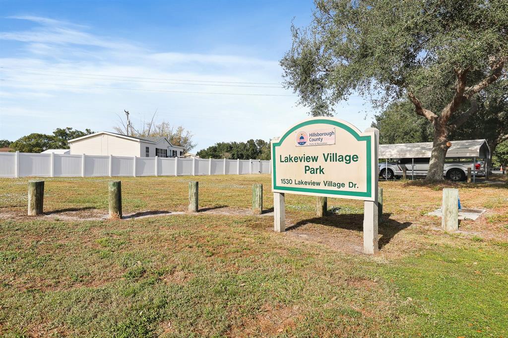 2107 Shady Point Lane Brandon, FL 33510 - Photo 34 of 38 a view of a bench in a park