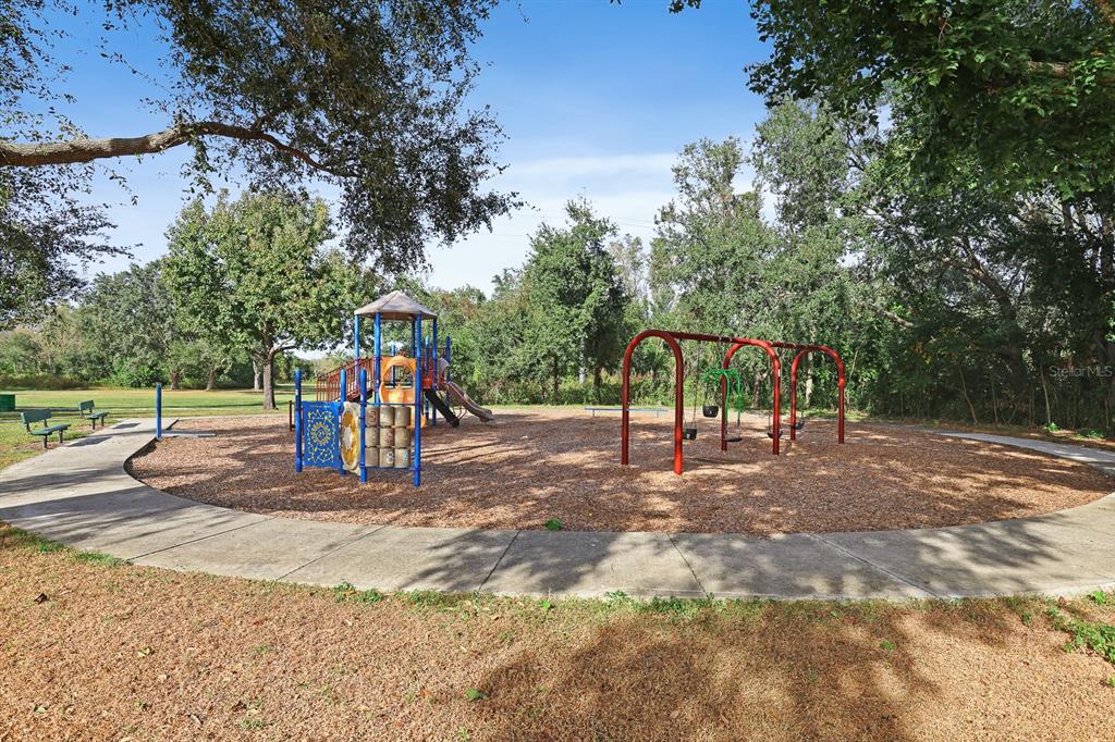 2107 Shady Point Lane Brandon, FL 33510 - Photo 35 of 38 a view of a park with swings