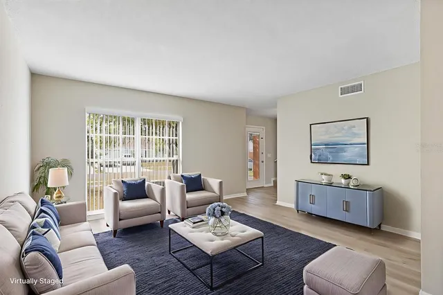 a living room with furniture and a couch