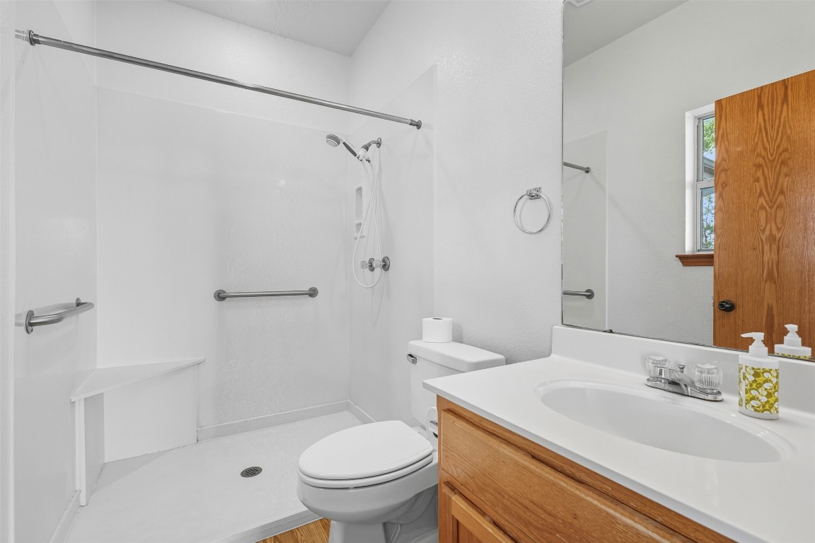 105 Davis Drive Thorndale, TX 76577 - Photo 31 of 40 a bathroom with a sink toilet and shower