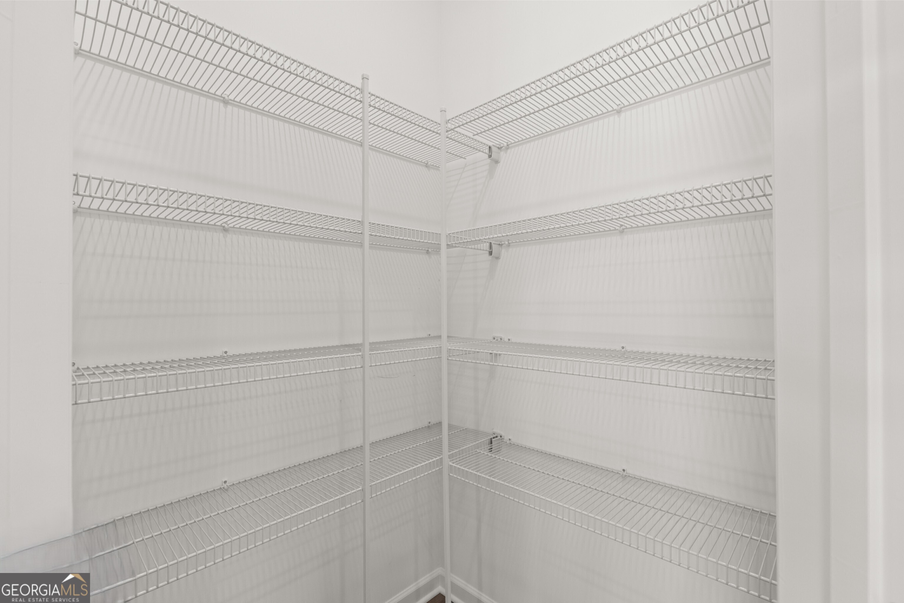 2464 Lennox Road Southeast Conyers, GA 30094 - Photo 14 of 27 a view of a room with racks on the wall