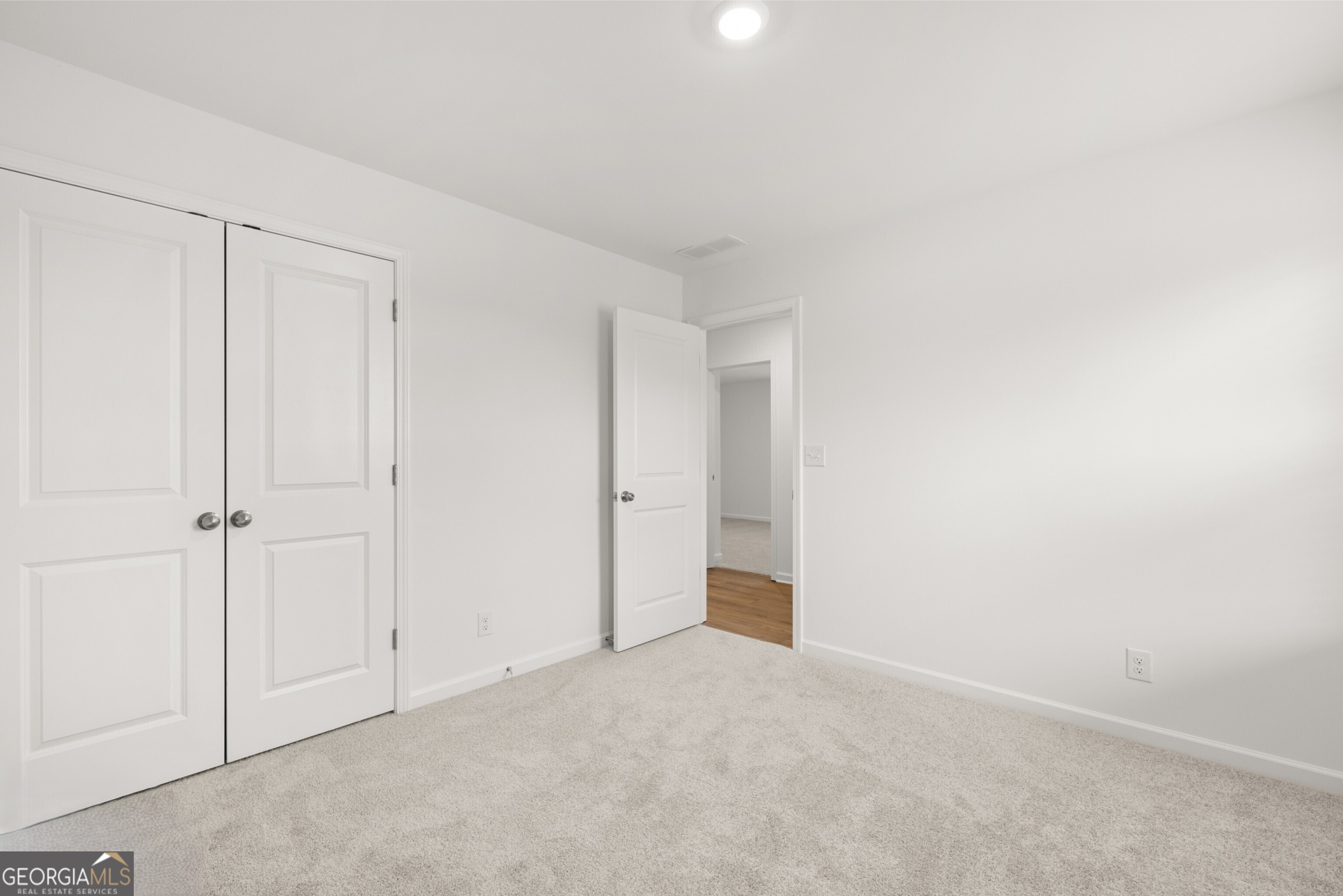 2464 Lennox Road Southeast Conyers, GA 30094 - Photo 21 of 27 a view of an empty room
